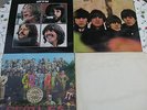 A Collection of Beatles LP's and Singles + Paul McCartney & John Lennon LP's