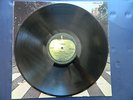 Beatles Abbey Road with pink tinge on the road on cover Stereo