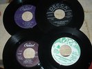 CHRISTMAS 45'S. 27 DIFFERENT. COMO, CROSBY, NAT KING COLE PLUS MANY OBSCURE.