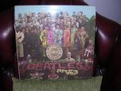 The Beatles vinyl album Sgt Pepper on Parlophone Mono PMC 7027 XEX 637-1/638-1