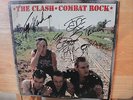 The Clash Combat Rock Signed by Band & Joe Strummer, including COA