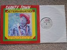 TRINITY: SHANTY TOWN DTERMINATION. JA