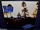 THE EAGLES RARE SEALED LP HOTEL CALIFORNIA 1976 USA 1ST PRESS W/RARE STICKER OOP