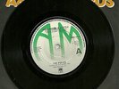 THE POLICE AMS 7474 MESSAGE IN A BOTTLE, GREEN A&M ON BLACK VINYL