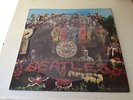 The Beatles: Sgt. Pepper LP  1979 UK picture Disc. PHO 7027.