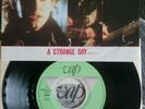 The cure the hanging garden / a strange day