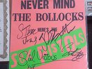 SEX PISTOLS NEVER MIND THE BOLLOCKS SIGNED ALL MEMBERS COA