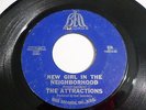 The Attractions 45 That Girl Is Mine / New Girl In The Neighborhood Vinyl Record