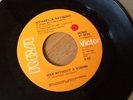 MICHAEL & RAYMOND; MAN WITHOUT A WOMAN/WALKING THE DOG. RCA VICTOR 47-9244
