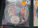 Three sealed picture disc, Abbey Road, Sgt Pepper, and Band On The Run