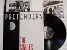 THE PRETENDERS SINGLES LP EX/EX VINYL + POSTER Greatest Hits Best Of