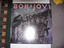 SLIPPERY WHEN WET by BON JOVI    Vinyl LP  1986 PolyGram Records Yellow or Red
