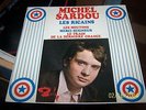 45T MICHEL SARDOU. LES RICAINS. LES MOUTONS/ LE TRAIN. MERCI SEIGNEUR