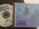 Nirvana signed CD. Nirvana Autograph. Dave, Kurt, Krist. Not Vinyl, 45, 7