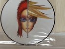 DAVID BOWIE - REBEL NEVER GETS OLD - 12 inch.  PICTURE DISC- MINT  