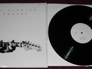 Slowhand 35th Anniversary import UK LP, Eric Clapton, was sealed opened to test