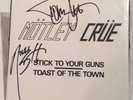 AUTOGRAPHED MÖTLEY CRÜE STICK TO YOUR GUNS LEATHÜR RECORDS 45 VINYL SINGLE