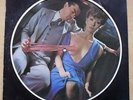 SCORPIONS LOVEDRIVE LP PIC DISC A FEW MARKS ON THE DISC/PLAYS WITH SOME CRACKLE