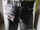 The Rolling Stones' Sticky Fingers' LP with Zipper Sleeve and Insert.