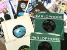 THE BEATLES  RARE FIRST PRESSINGS ,INC FOUR  SINGLES AND PAPER COLLECTION