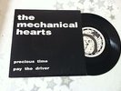 THE MECHANICAL HEARTS - PRECIOUS TIME / PAY THE DRIVER - VINYL = UNPLAYED MINT.