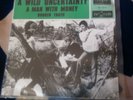 A WILD UNCERTAINTY - A MAN WITH MONEY - RARE 7'' BEAT - MINT