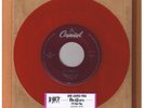 BEATLES - SHE LOVES YOU / I'LL GET YOU 45 CAPITOL  LIMITED  RED VINYL  MINT 1994