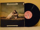 JOHN AND BEVERLY MARTYN  