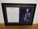 Eric Clapton Hand Signed/Autographed Songsheet with a Poster and COA
