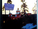 EAGLES HOTEL CALIFORNIA RARE ORIG'76 ASYLUM LP IN SHRINK w/POSTER & STICKER MINT