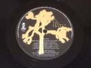 U2: The Joshua Tree Original 1987 LP Vinyl Pressing With Lyrics & Poster
