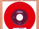 BEATLES - SHE LOVES YOU / I'LL GET YOU 45  CAPITOL  LIMITED RED VINYL  MINT 1994
