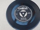 Peanuts Wilson Cast Iron Man Vinyl Coral 7
