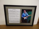 Eric Clapton Hand Signed/Autographed Songsheet with a Poster and COA
