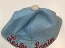 Lester Lanin Hat With A White Ball On Top & His Name In red Script white ball