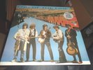 TRAVELING WILBURYS.END OF THE LINE.12'' VINYL WITH STICKER SHEET.MINT