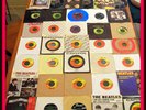 Lot-88 BEATLES 45 records- Paul McCartney, John Lennon, Ringo, George- in a case