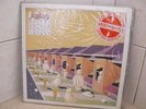 SKYHOOKS GUILTY UNTIL PROVEN INSANE RED VINYL LP 12'' NEAR MINT CONDITION