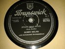 BOBBY HELMS : JINGLE BELL ROCK / CAPTAIN SANTA CLAUS.  UK.78rpm (1958)