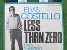 ELVIS COSTELLO debut 7“ GERMAN IMPORT with BLUE RIMMED sleeve ‘Less Zero’ 1977