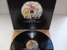 QUEEN-A DAY AT THE RACES...SUPERB 1ST UK PRESSING NEAR MINT VINYL LP RECORD 1976