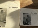 The pogues fairytale of New York City 12in vinyl and 7in record there is a stamp