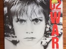 U2 WAR   plus 3 x bonus singles Pride, New Years Day & Two Hearts Beat as One