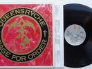 181C	Queensryche	Rage for Order	(1C 064-24 0579 1)	German LP + OIS, emi america