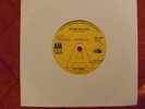 Ken Parker  We Must Be In Love. A&M Advance Promo 7'' single record .AMS 7092