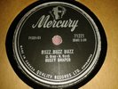 RUSTY DRAPER : BUZZ BUZZ BUZZ / I GET THE BLUES WHEN IT RAINS. Can 78rpm (1957)