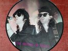 THE SISTERS OF MERCY - WE'RE ALL AWARE OF - LP PIC - 1986 -USA- EX/ LIVE ROME