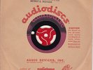 A Blank Unused Audiodisc Acetate with letter from a Studio on how to use.