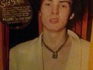 sid sings sid vicious record with poster