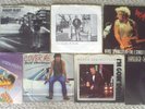 BRUCE SPRINGSTEEN - 7 45's WITH PICTURE SLEEVES. ALL 7 ARE MINT-